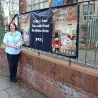 Gill Blades, Senior Library Assistant at Gainsborough Library, with the first batch of treasure maps