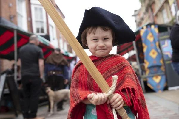 Boy with sword at Merry Olde Market