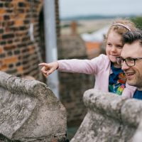 Man and girl at Gainsborough Old Hall during half term in Gainsborough.