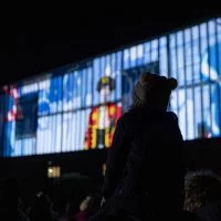 Girl watching Illuminate projections