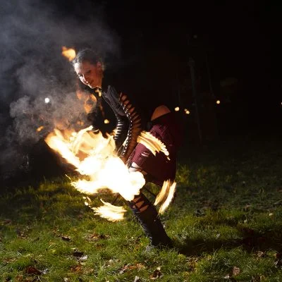 Dance artist in Illuminate Fire Garden - Guiding Sparks Circus