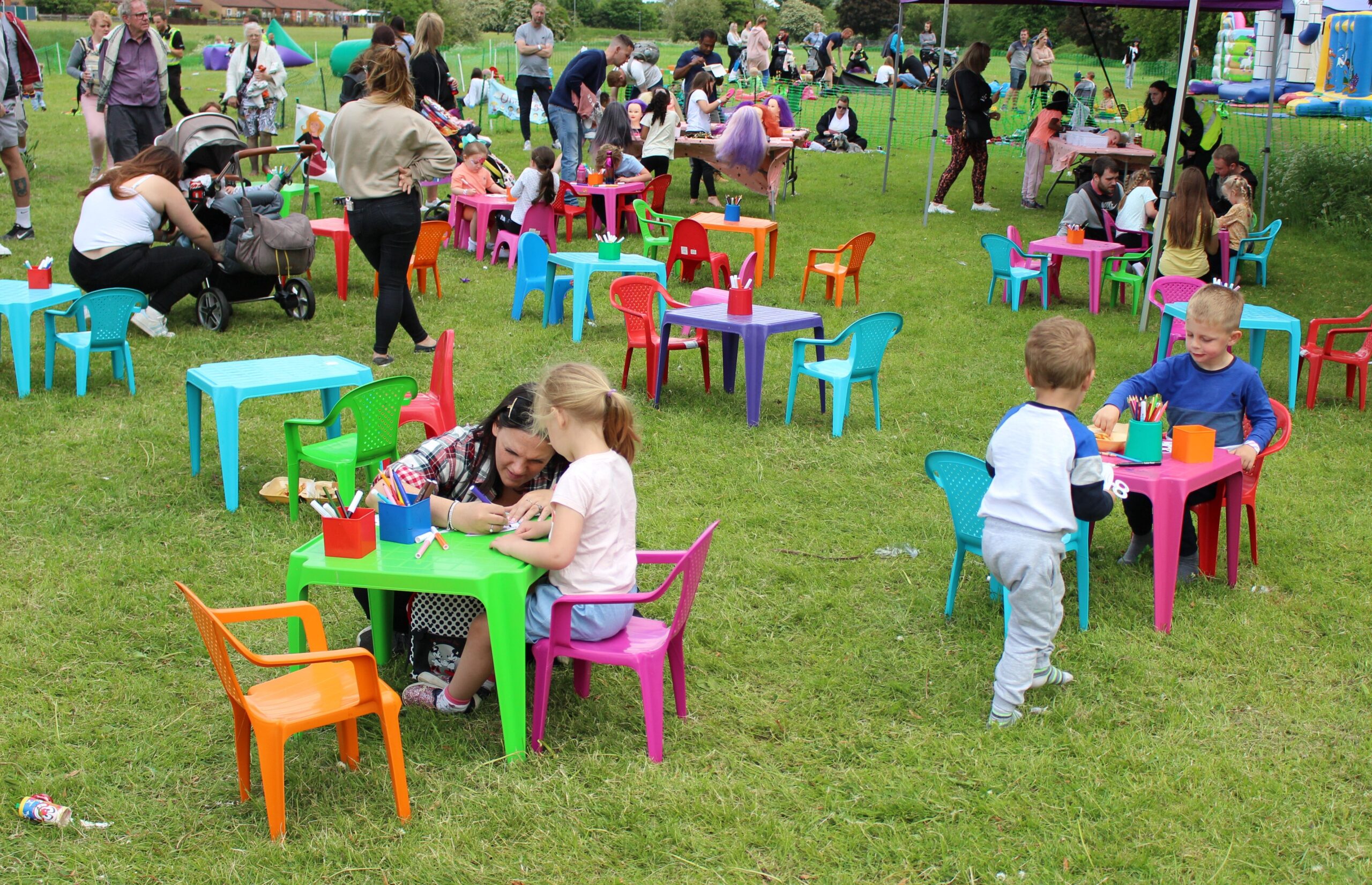 Children sat doing craft activities at Funtopia