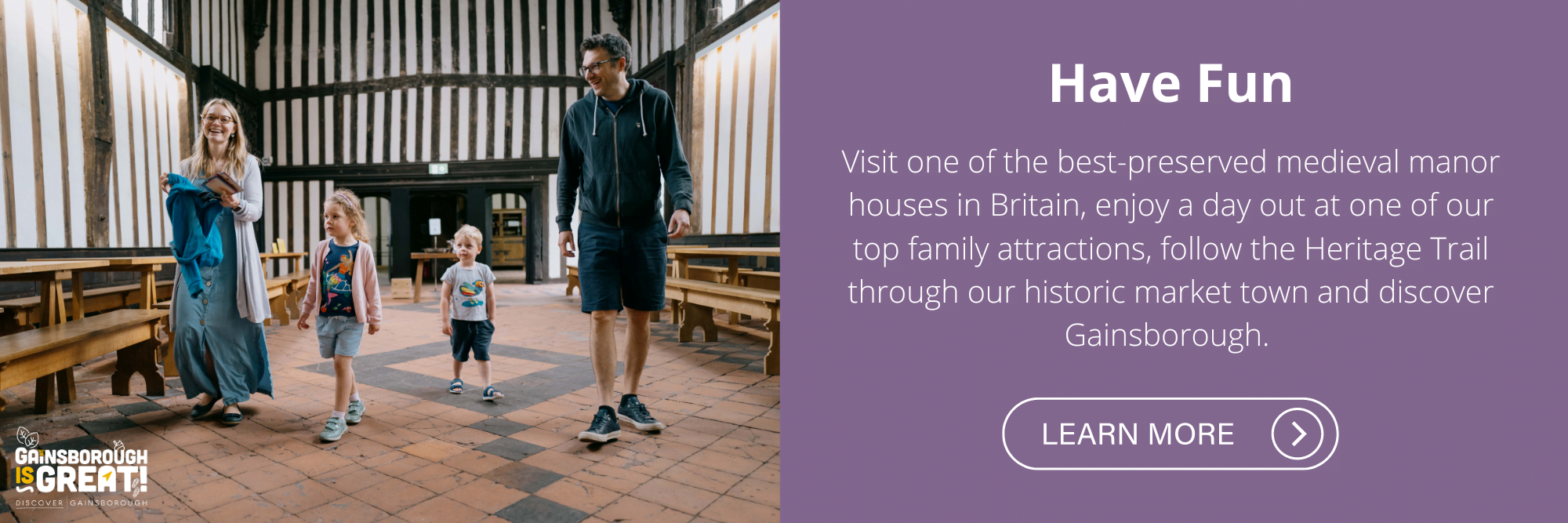 A family walking through the great hall at Gainsborough Old Hall.
