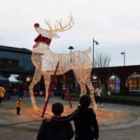 youngsters admiring the Christmas decorations at Marshall's Yard