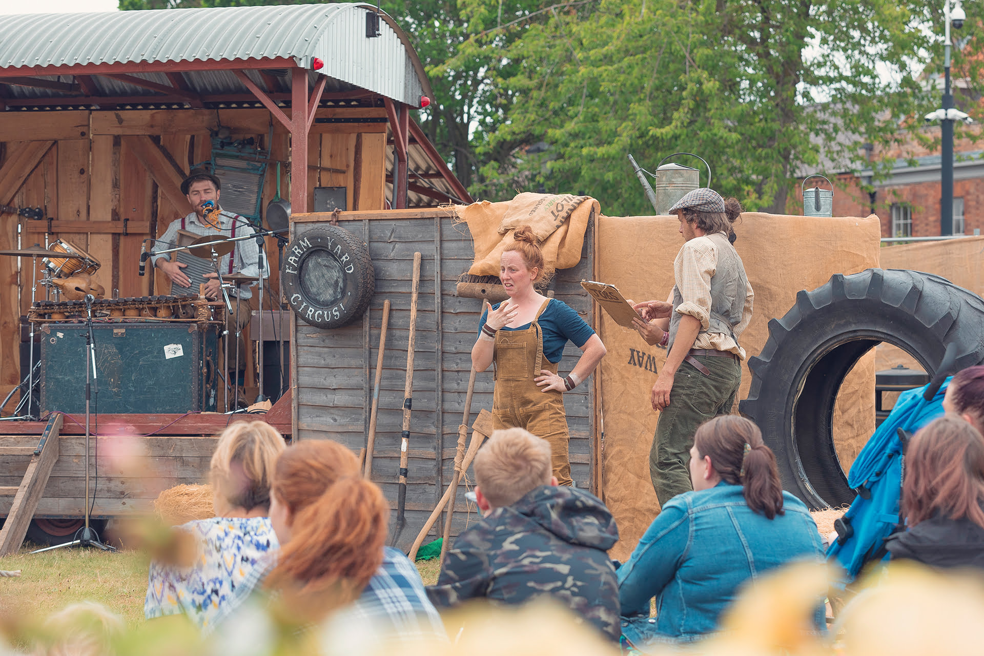 &#039;Farmyard Circus&#039; at the Revive Festival performing group acrobatics, juggling, theatre, and live music.