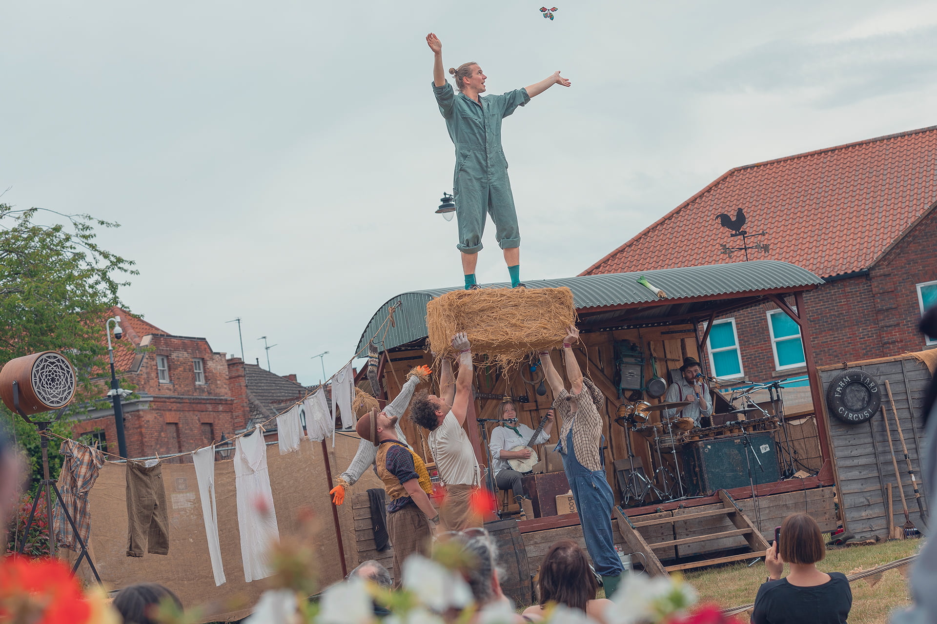 &#039;Farmyard Circus&#039; at the Revive Festival performing group acrobatics, juggling, theatre, and live music.
