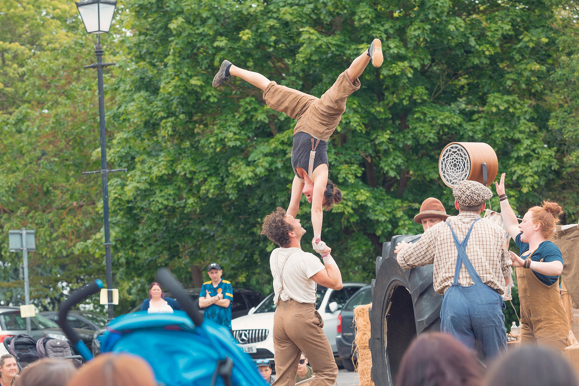 &#039;Farmyard Circus&#039; at the Revive Festival performing group acrobatics, juggling, theatre, and live music.