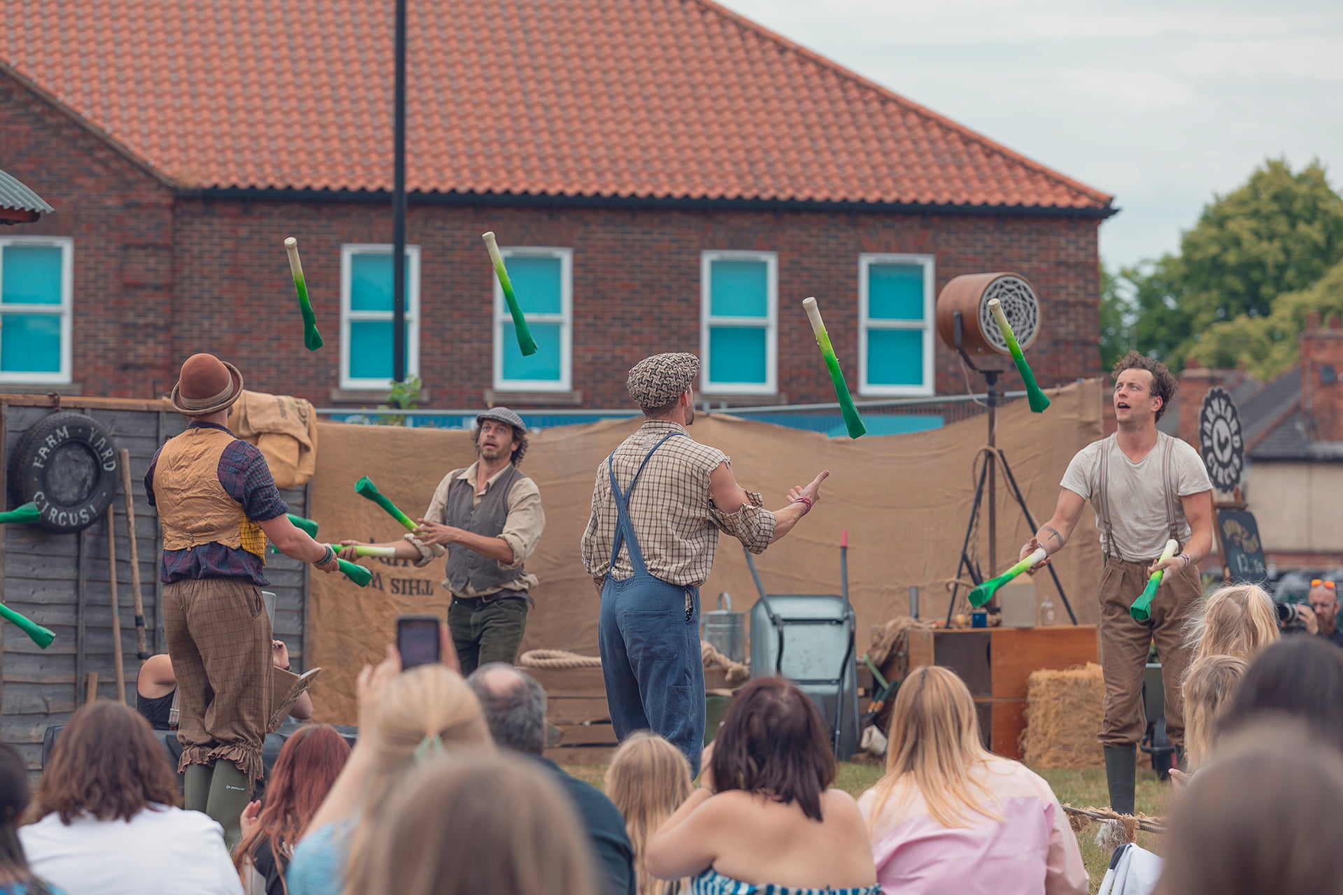 &#039;Farmyard Circus&#039; at the Revive Festival performing group acrobatics, juggling, theatre, and live music.
