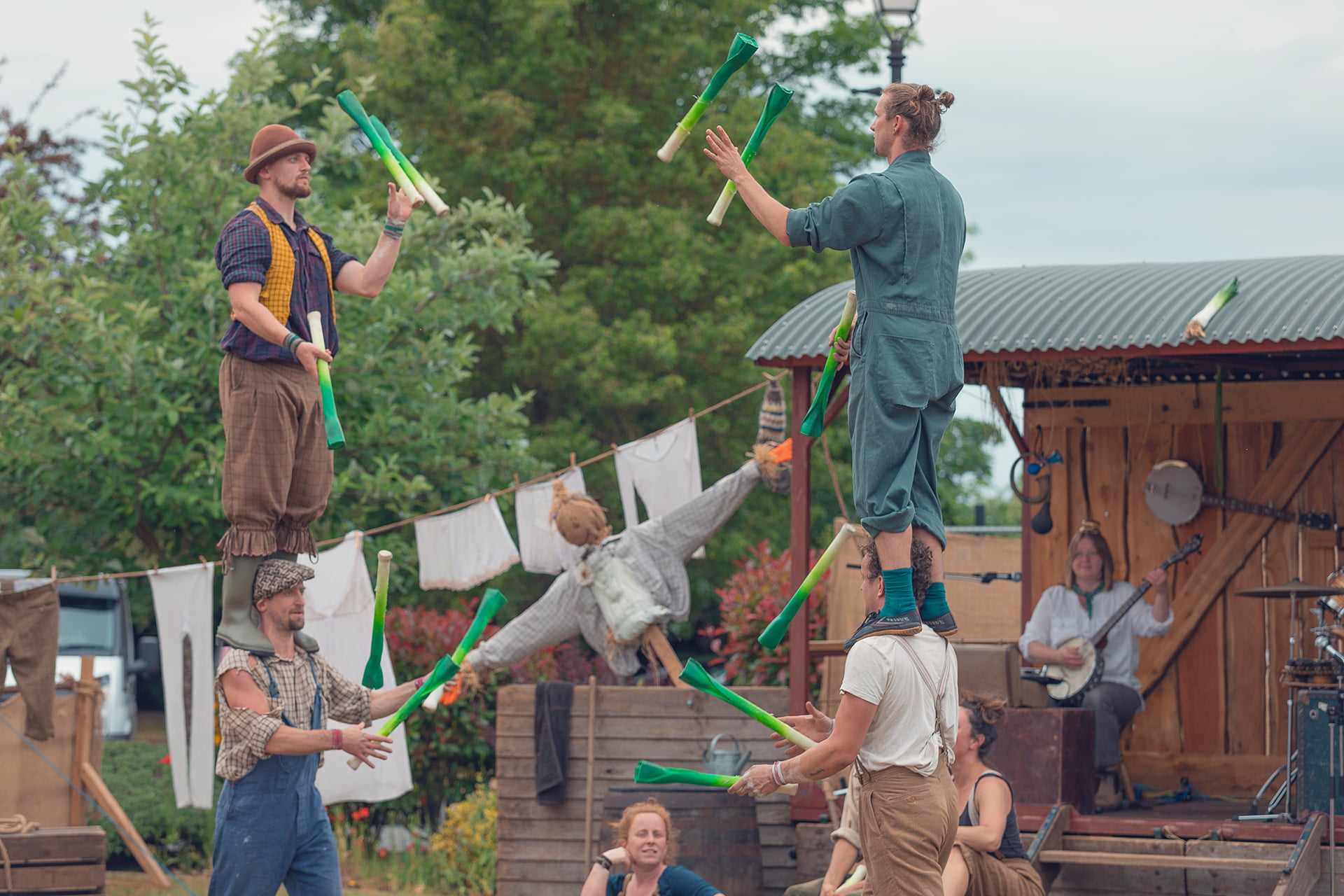 &#039;Farmyard Circus&#039; at the Revive Festival performing group acrobatics, juggling, theatre, and live music.