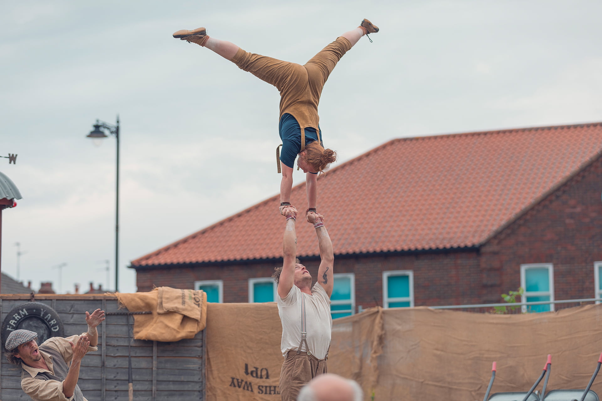&#039;Farmyard Circus&#039; at the Revive Festival performing group acrobatics, juggling, theatre, and live music.