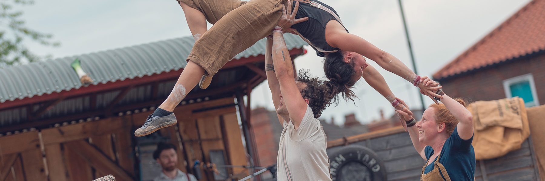'Farmyard Circus' at the Revive Festival performing group acrobatics, juggling, theatre, and live music.