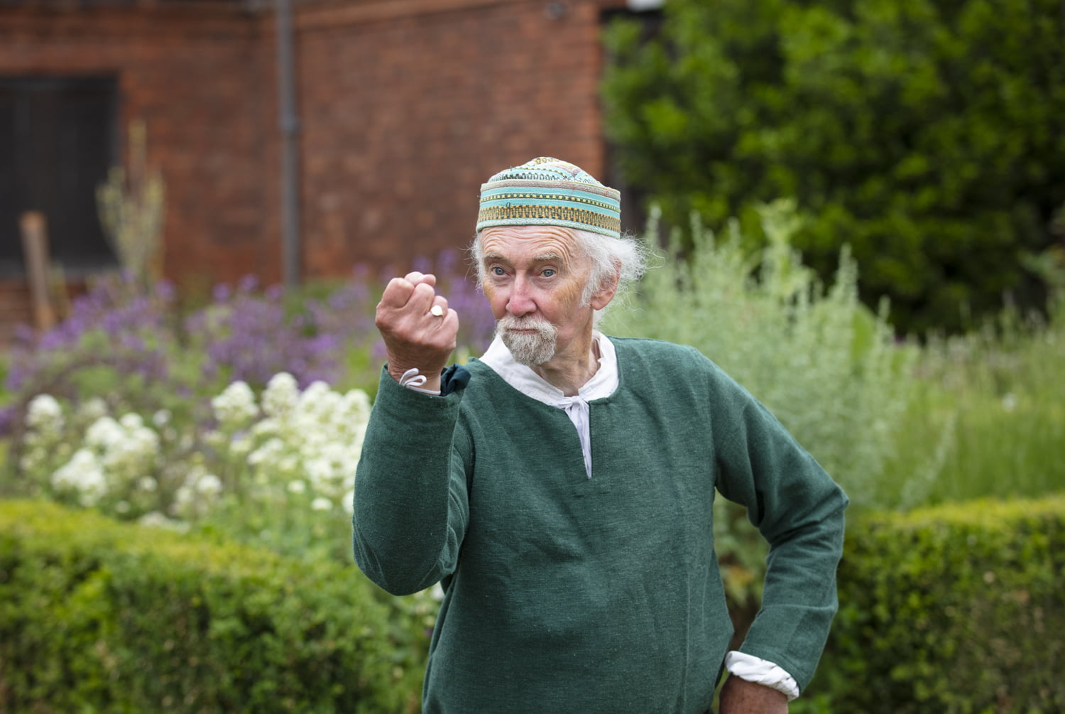 Man in period costume outside Gainsborough Old Hall