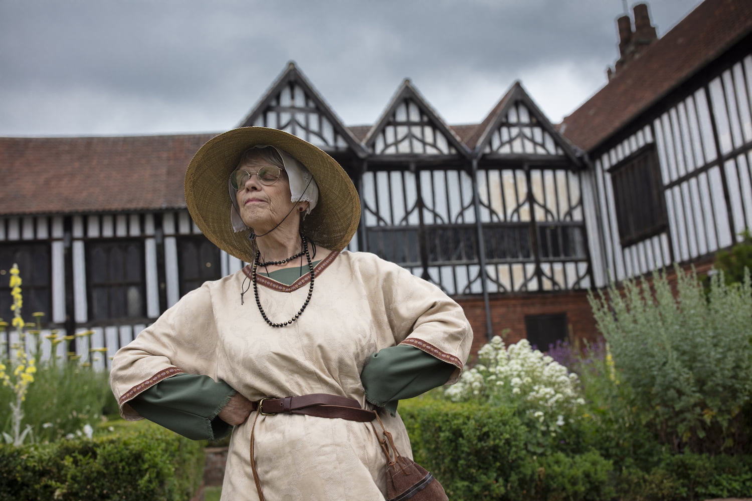 Person in period costume stood outside Gainsborough Old Hall