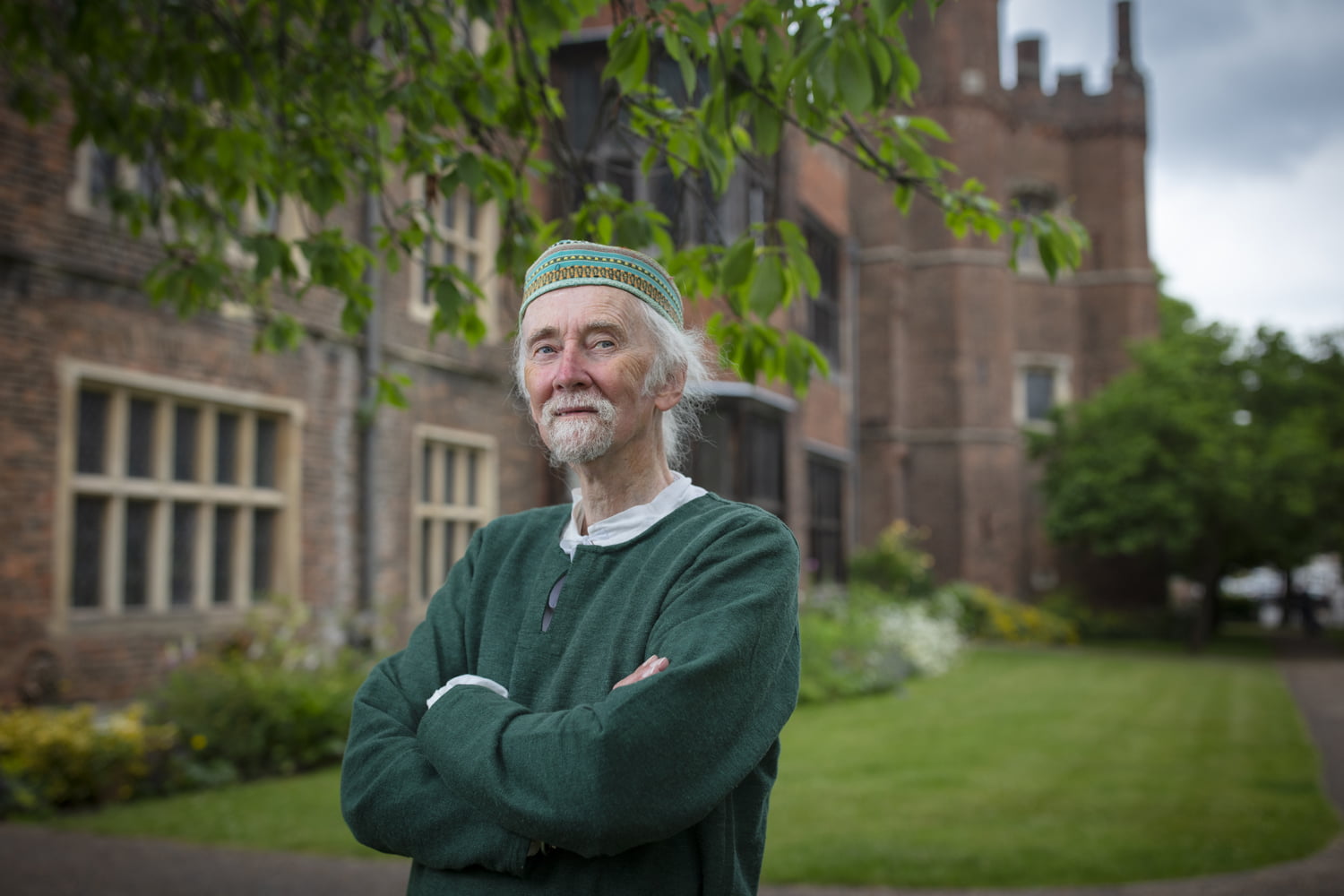 Man in period costume stood outside Gainsborough Old Hall