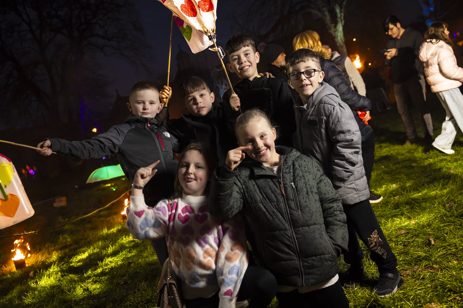Group of children in the fire garden at Illuminate 2024.