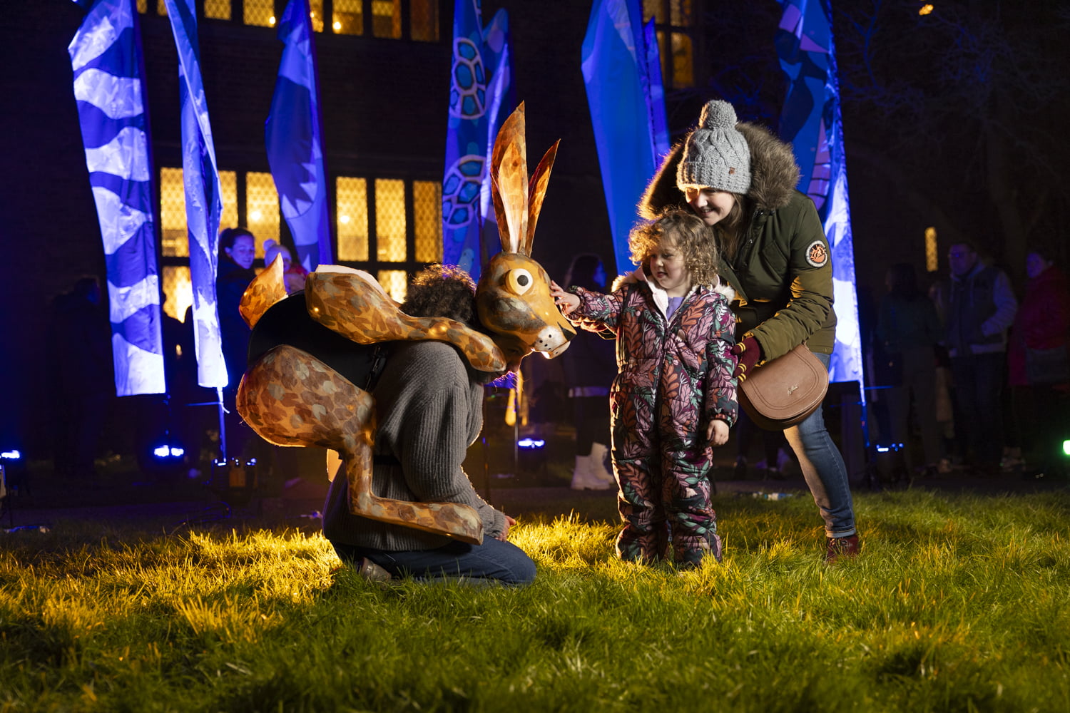 Visitors greeting the hare outside Gainsborough Old Hall.