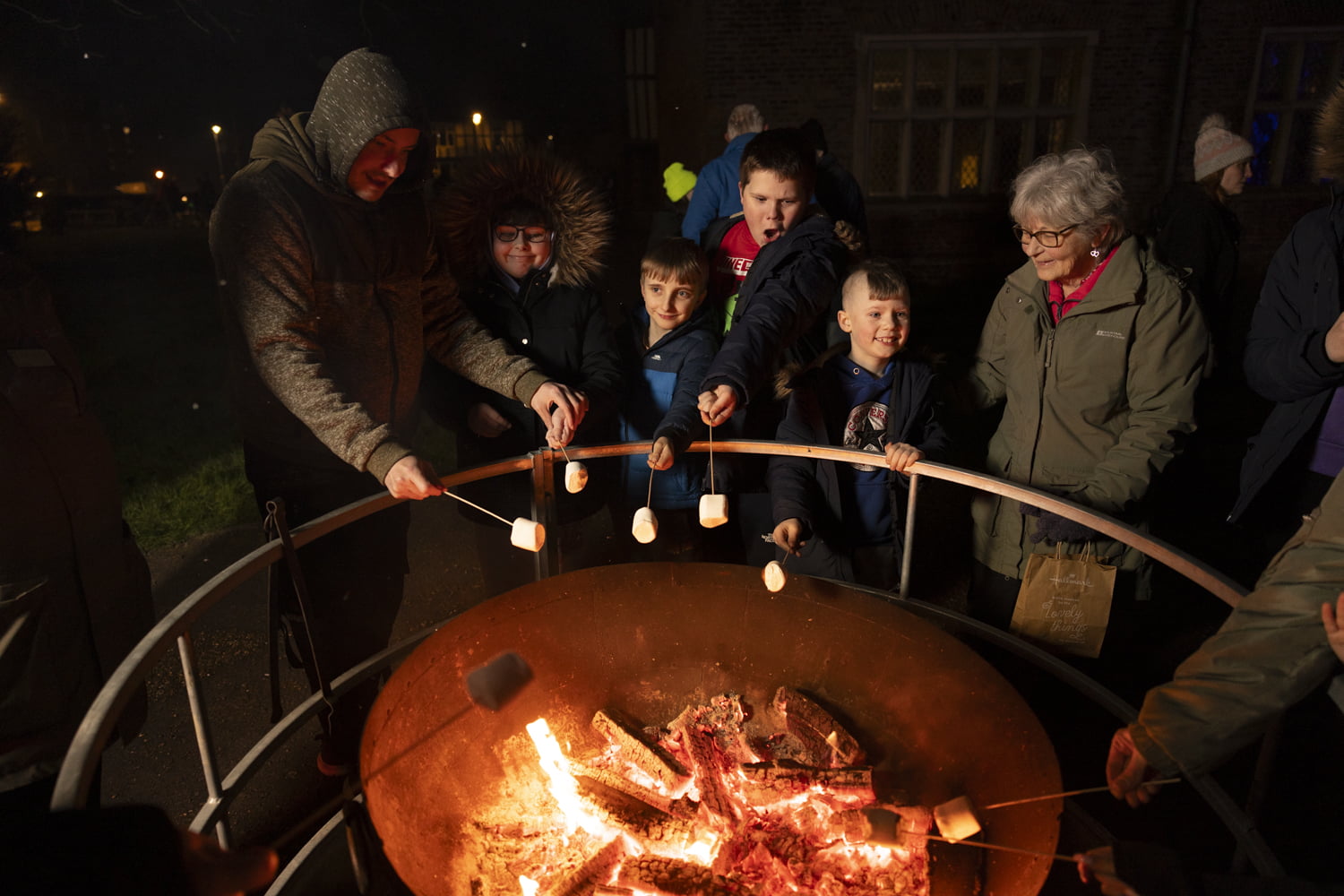 Toasting marshmallows outside Gainsborough Old Hall.