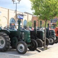 Tractors lined up in the car park for Marshall's Yard's annual tractor event