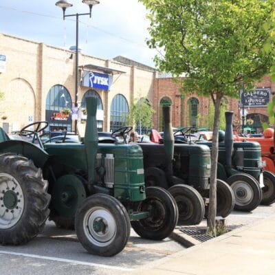 Tractors lined up in the car park for Marshall's Yard's annual tractor event